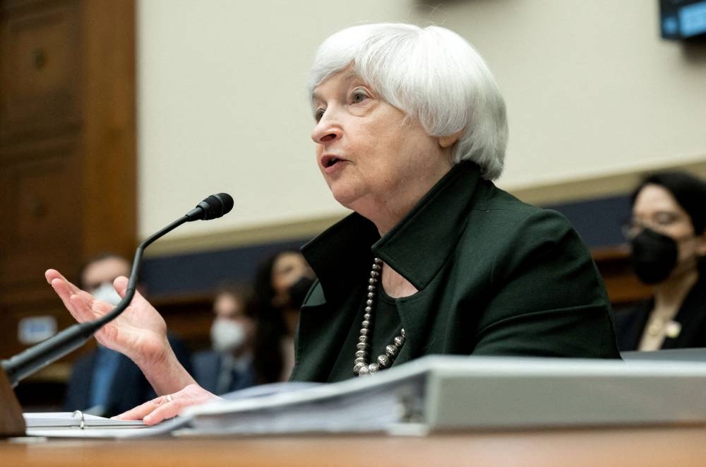 US Treasury Secretary Janet Yellen testifies during a US House Committee on Financial Services hearing on the Annual Report of the Financial Stability Oversight Council, on Capitol Hill in Washington, DC May 12, 2022. — Reuters pic