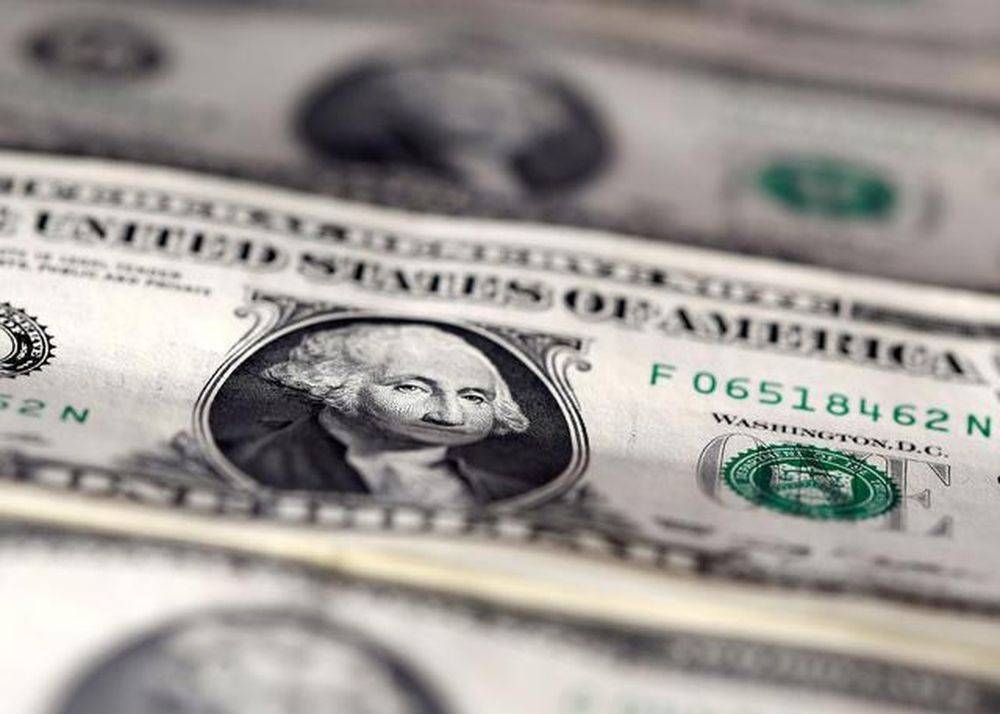 Dollar falls for first week in seven amid US yield retreat