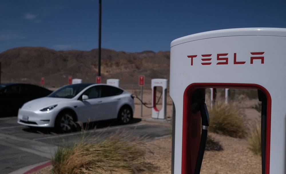 Cars swapping vroom for volts in London garage