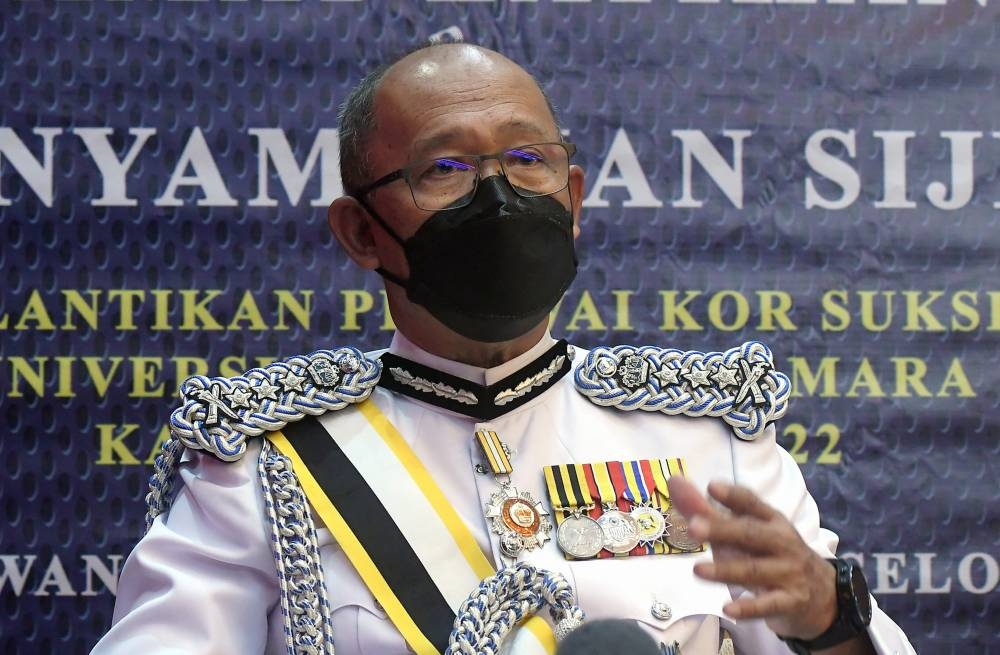 Selangor police chief Datuk Arjunaidi Mohamed speaks during the Police Undergraduate Voluntary Corps graduation ceremony in Shah Alam May 22, 2022. — Bernama pic