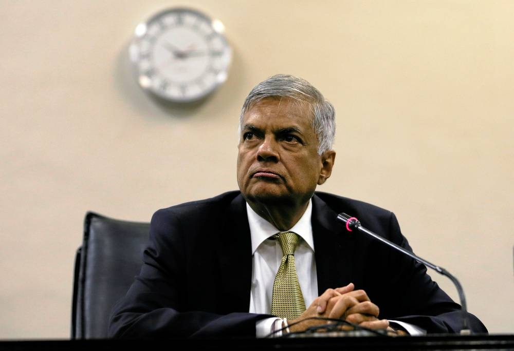 Sri Lankan Prime Minister Ranil Wickremesinghe looks on at a news conference after he survived a no-confidence vote in parliament in Colombo April 4, 2018. Last week, Wickremesinghe’s office said the new premier was expected to be given the additional responsibility of managing the country’s finances to pull it out of bankruptcy. — Reuters pic