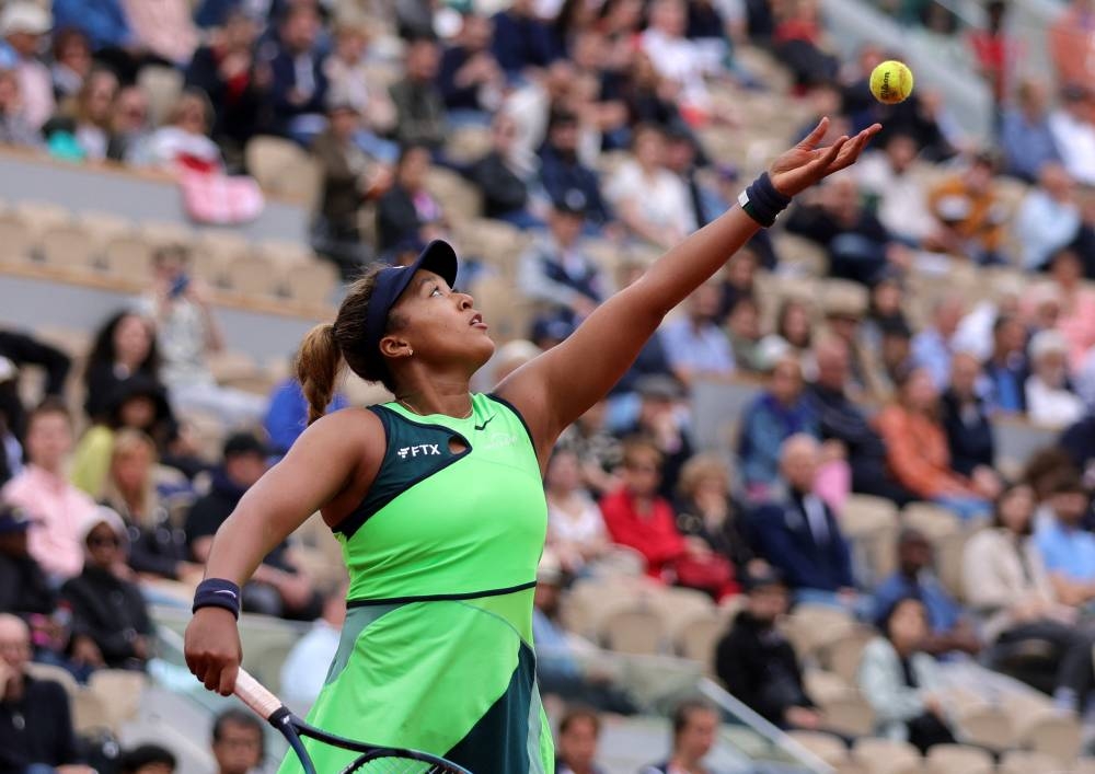 Osaka out at French Open as Swiatek extends winning run