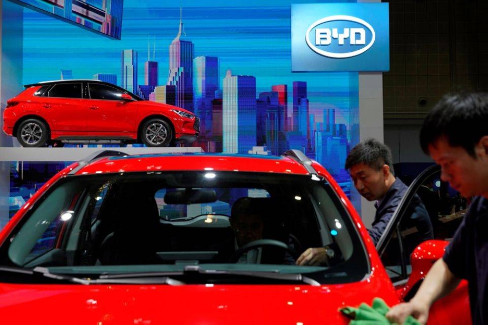 Electric car sales soar but raw materials a concern, says report