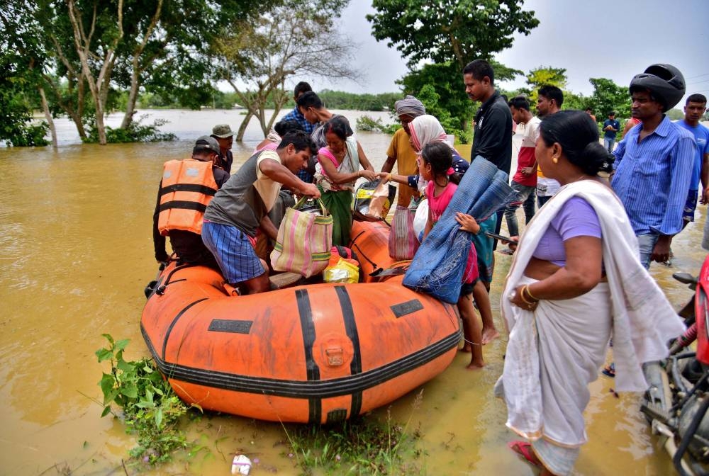 Floods kill 25 in India's Assam, displace thousands