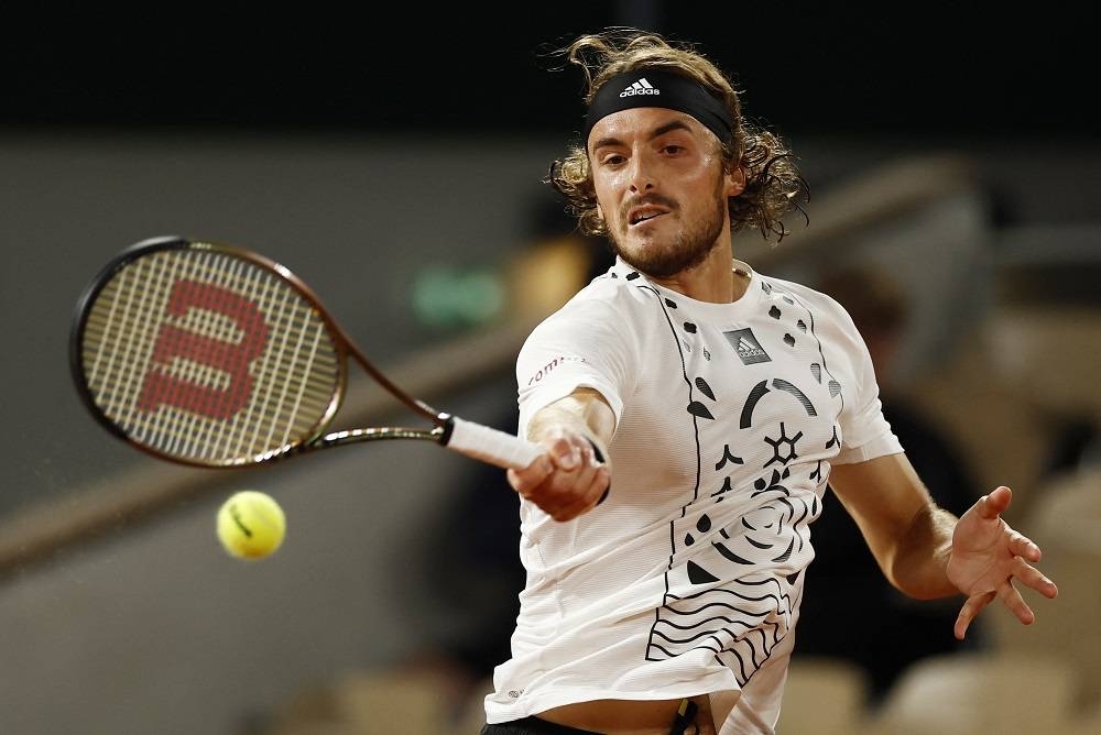 Tsitsipas survives first-round scare to progress in Paris