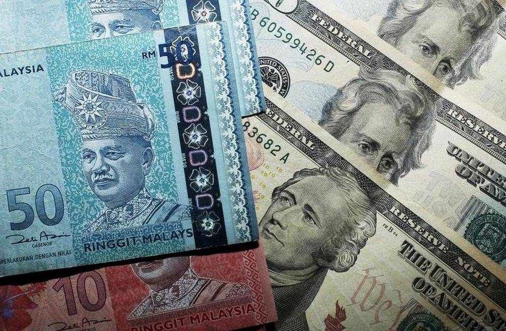 Ringgit opens marginally higher against greenback