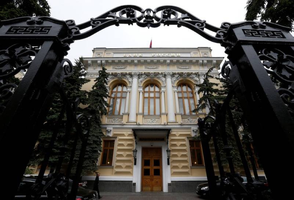 Russian central bank slashes key rate, sees room to cut further