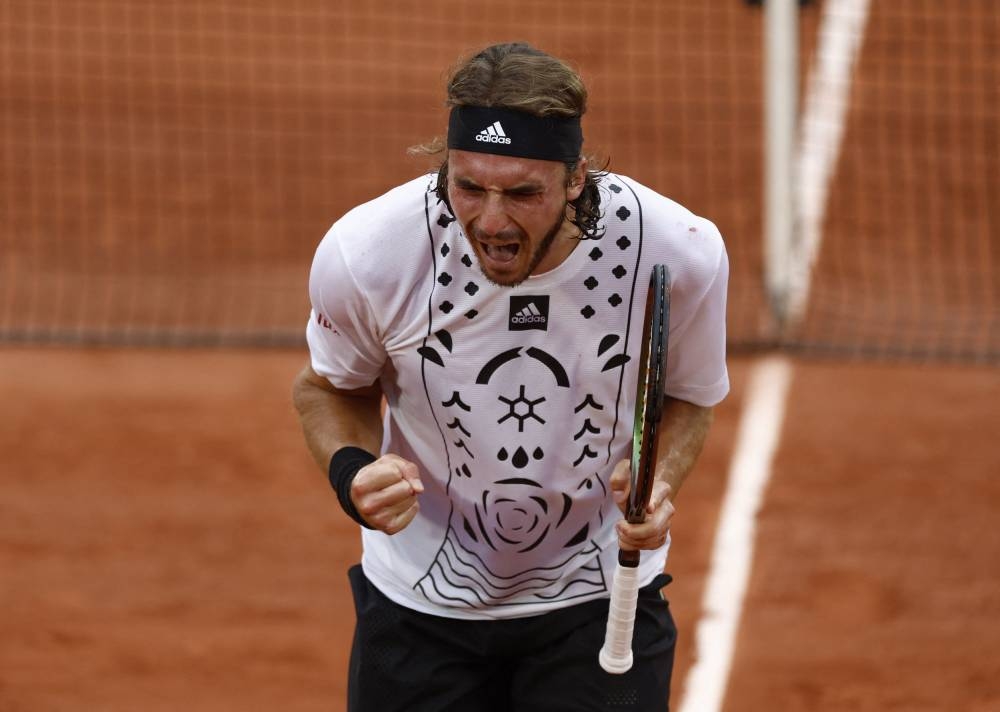 Tsitsipas survives another French Open epic as Halep stunned by Chinese teen Zheng