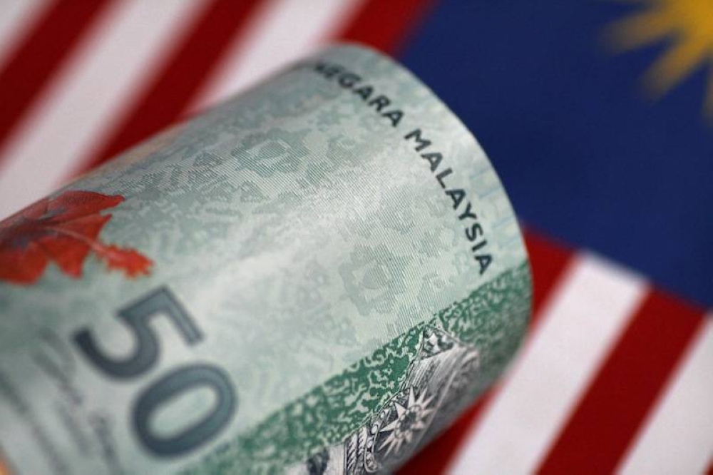 Ringgit opens marginally higher against US dollar