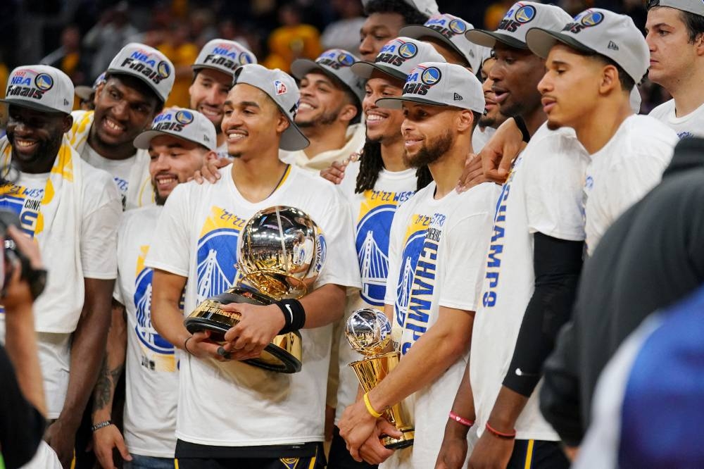 The Golden State Warriors celebrate after winning game five of the 2022 western conference finals against the Dallas Mavericks at the Chase Centre May 26, 2022. — Reuters pic 