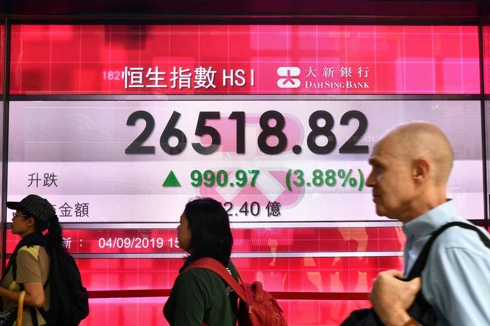 Asian markets track Wall Street higher, tech fuels Hong Kong rally