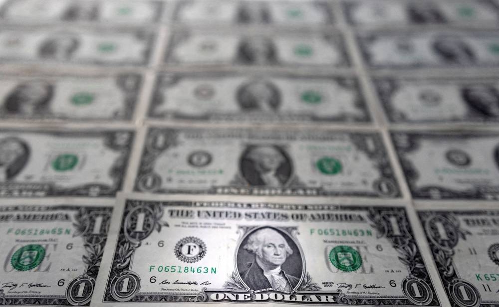 Dollar drifts up but set for biggest weekly drop in four months