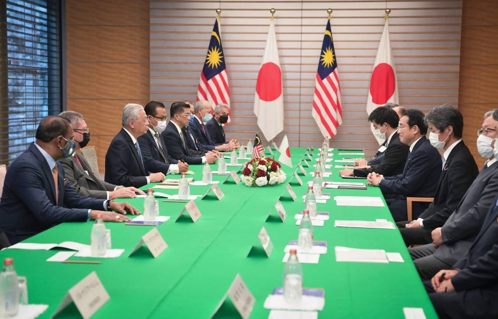 Prime Minister Datuk Seri Ismail Sabri Yaakob meets his Japanese counterpart, Fumio Kishida, to discuss efforts to boost Malaysia-Japan relations at the Japanese Prime Minister’s Office in Tokyo May 27, 2022. — Bernama pic