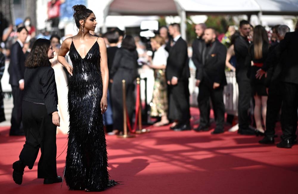 Deepika Padukone Wore Louis Vuitton To The 'Elvis' Cannes Film Festival  Premiere - Red Carpet Fashion Awards