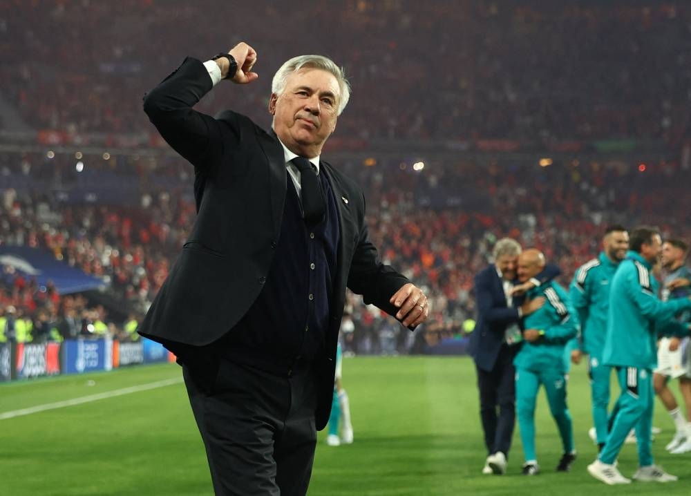 ‘Record man’ Ancelotti puts his landmark down to luck