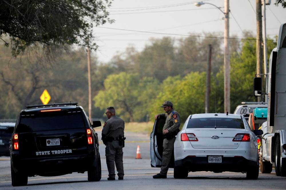 Investigators question delayed police response in Texas school shooting