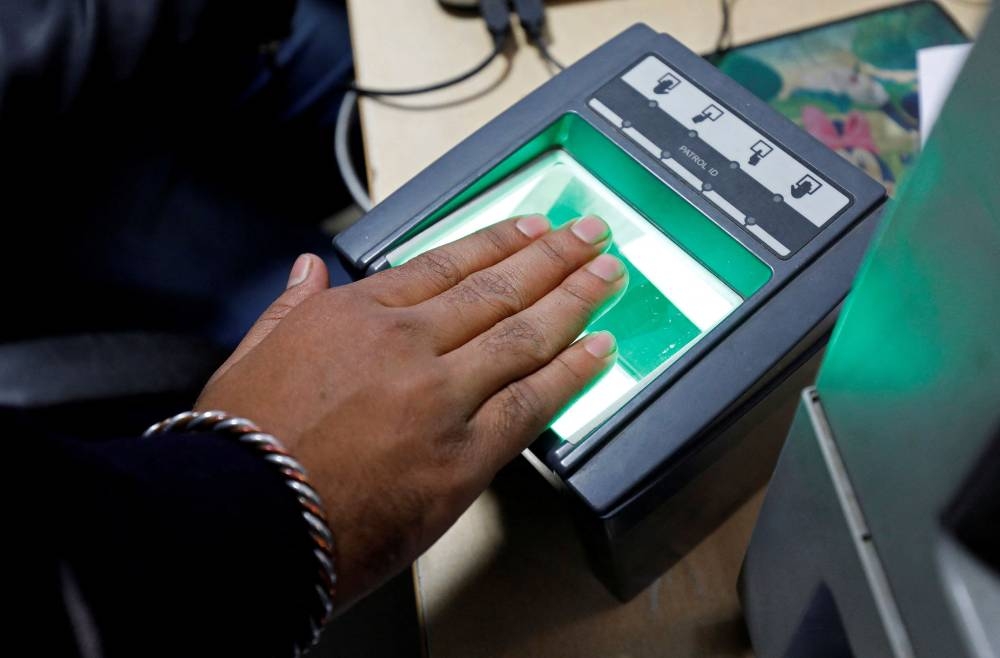 India withdraws warning on national biometric ID after online panic