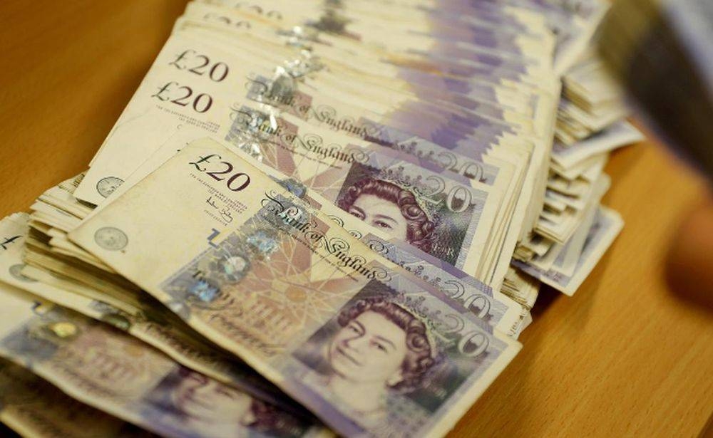 Sterling steady near one-month high