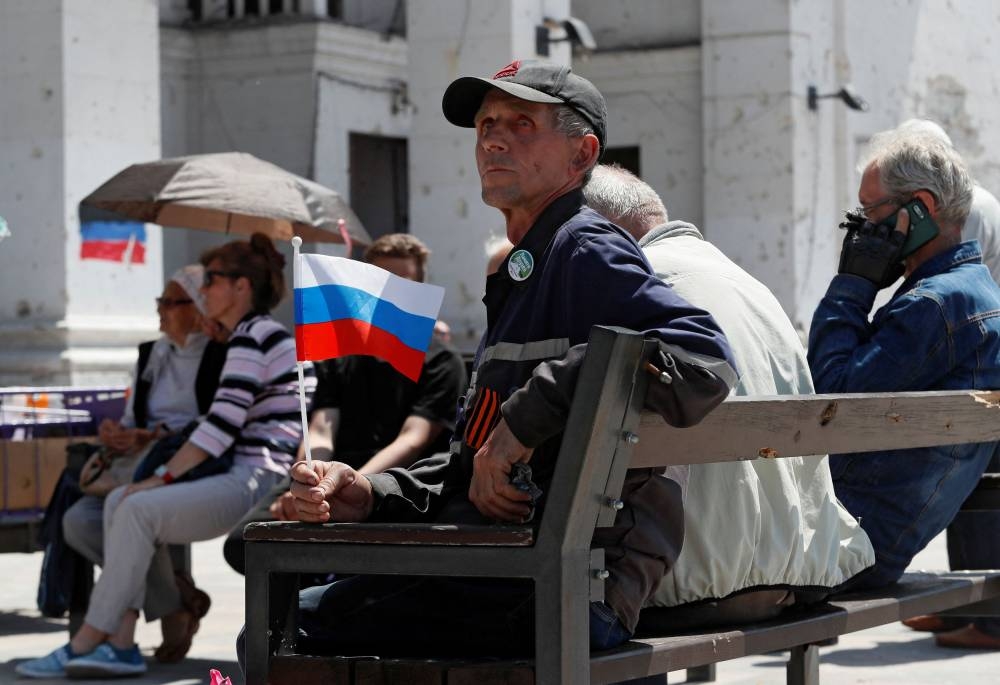 Life in Ukraine’s post-siege Mariupol: Barter markets and Russian TV