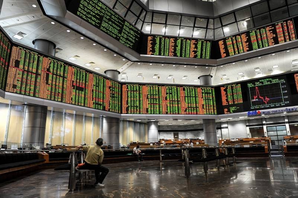 Bursa Malaysia ends morning session lower