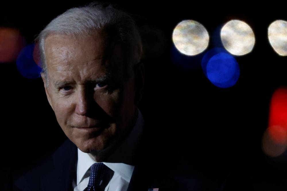 Biden says he will meet with Congress about guns