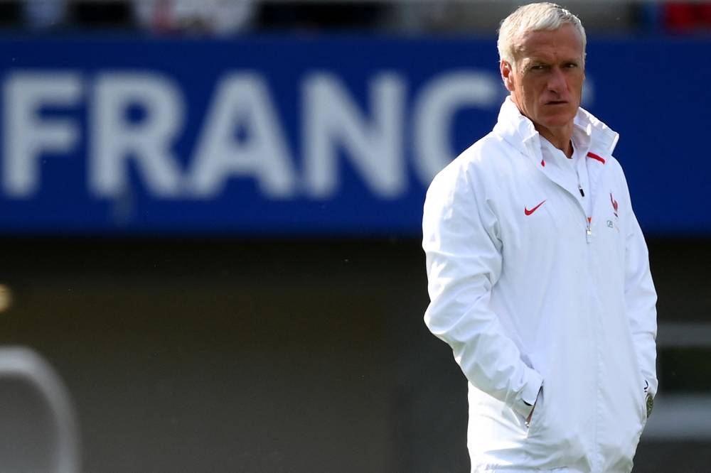 France’s head coach Didier Deschamps looks on during a training session in Clairefontaine-en-Yvelines May 30, 2022 as part of the team’s preparation for the upcoming Uefa Nations League. Deschamps has left the national squad after his father died, the French federation said today. — AFP pic 