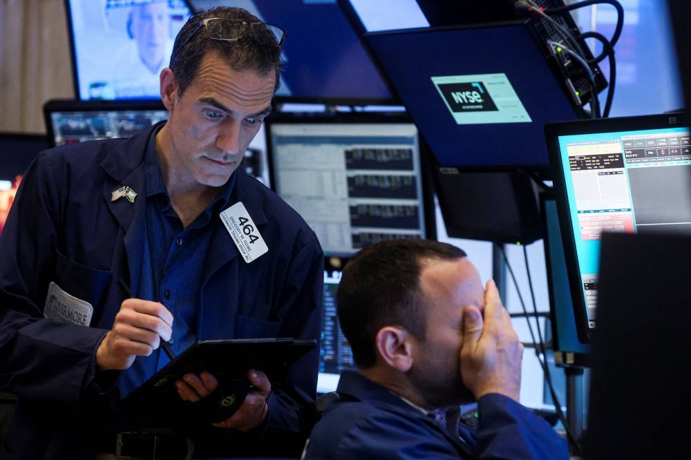 Wall Street ends lower as economic data fails to ease rate hike angst