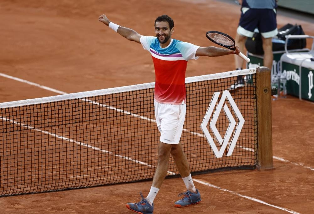 Cilic, Ruud reach French Open semi-finals for first time