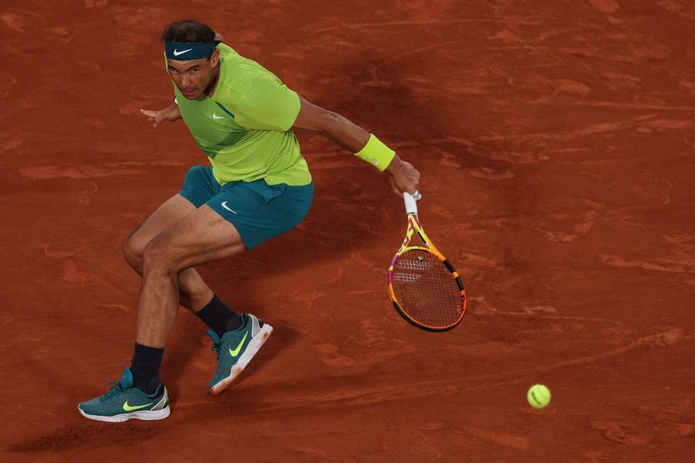 Spain’s Rafael Nadal returns the ball to Serbia’s Novak Djokovic during their men’s singles match on day ten of the Roland-Garros Open tennis tournament at the Court Philippe-Chatrier in Paris, May 31, 2022. — AFP pic