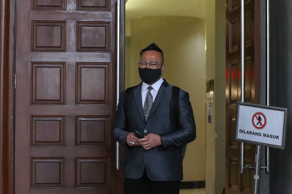 Datuk Seri Khairuddin Abu Hassan leaves the Kuala Lumpur High Court Complex April 27, 2021. —  Picture by Yusof Mat Isa