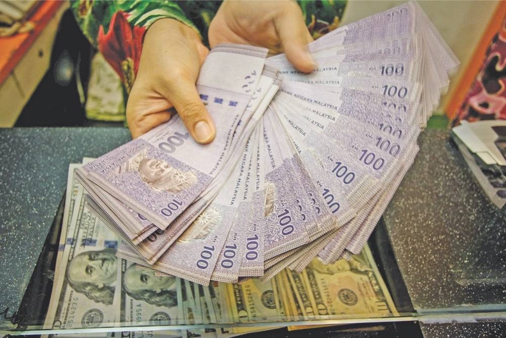 Ringgit ends lower against US dollar for third day running