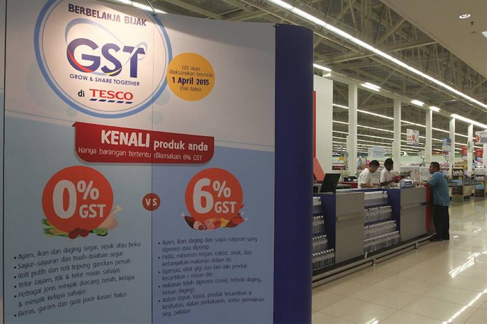 A board explaining how the GST works is seen at the Tesco Extra supermarket in Shah Alam in this file picture taken on March 29, 2015. — Picture by Yusof Mat Isa