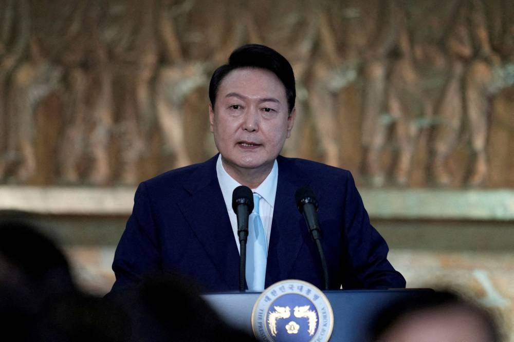 South Korea’s new president Yoon Suk-yeol speaks during the 20th Presidential inaugural reception at the National Assembly in Seoul May 10, 2022. — Reuters pic