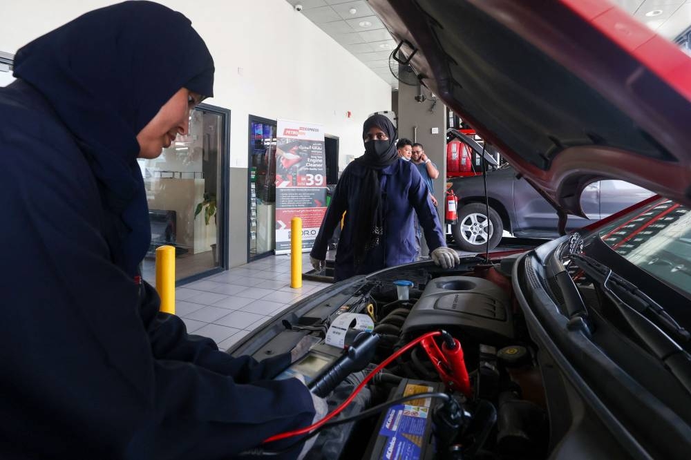 Saudi women move from behind wheel to under the hood