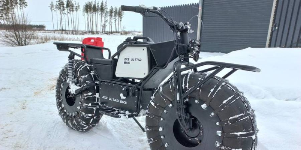 This all-terrain motorcycle stores fuel in its wheel rims