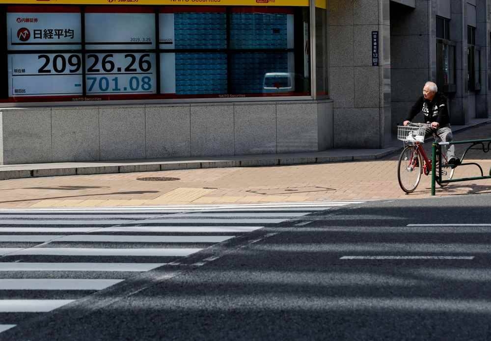 Asian markets track Wall Street rally ahead of jobs data, oil holds gains