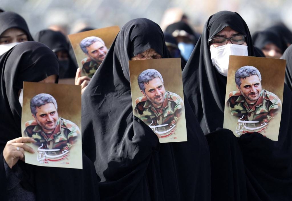 Iran probes death of Guard, denies assassination