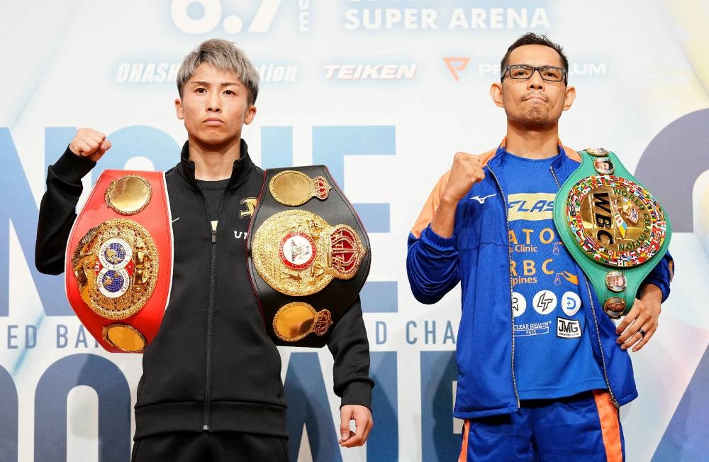 IBF and WBA bantamweight boxing champion Naoya Inoue of Japan (left) and WBC champion Nonito Donaire of Philippines pose during a press event in Yokohama June 3, 2022. — Japan Pool / Jiji Press / AFP pic