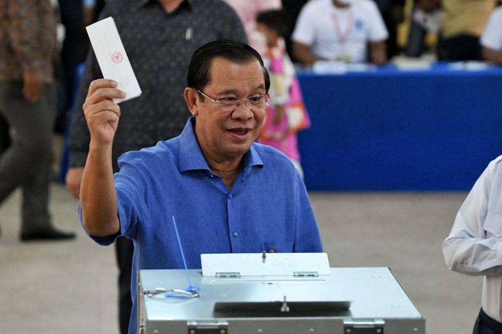 Cambodians vote in local polls as revived opposition vies for seats