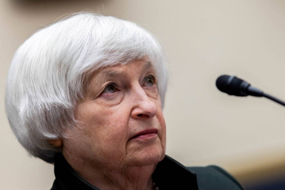 US Treasury Secretary Janet Yellen looks on during a US House Committee on Financial Services hearing on the Annual Report of the Financial Stability Oversight Council, on Capitol Hill in Washington, DC May 12, 2022. — Reuters pic