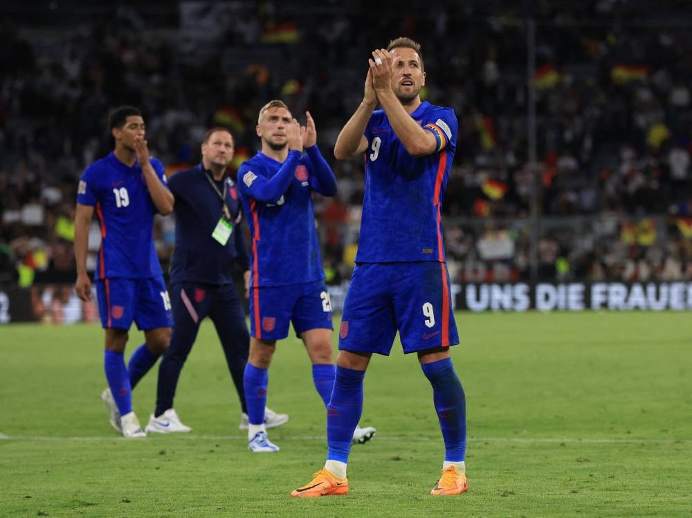 England's Harry Kane applauds fans after the match against Germany at the Allianz Arena, Munich June 7, 2022. — Reuters pic