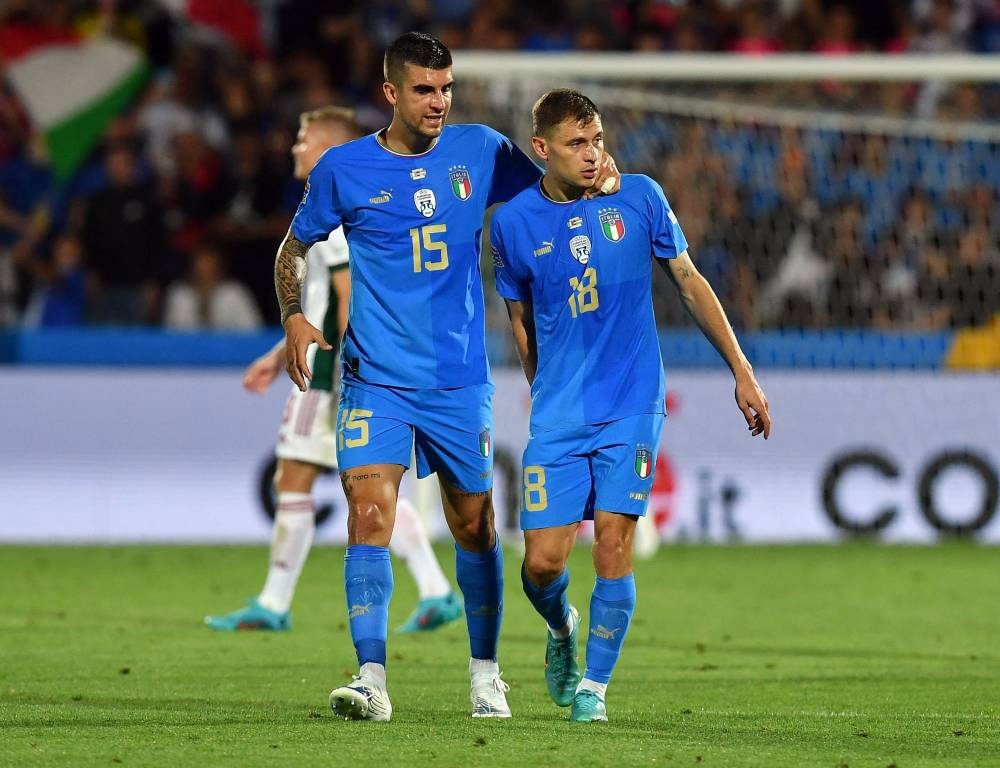 Italy's Nicolo Barella (right) celebrates scoring their first goal against Hungary with Gianluca Mancini at Stadio Dino Manuzzi, Cesena June 7, 2022. — Reuters pic