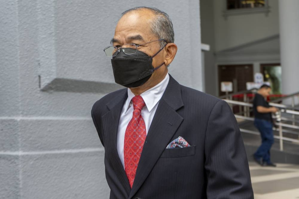 Tan Sri Mohd Sidek Hassan is seen outside the Kuala Lumpur Court Complex on June 8, 2022. —Picture by Shafwan Zaidon