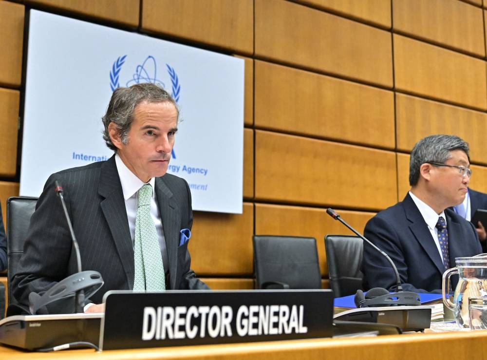 International Atomic Energy Agency (IAEA) Director-General Rafael Grossi (left) and China's Ambassador to the Permanent Mission at the United Nations Wang Qun attend the quarterly IAEA Board of Governors meeting at the agency headquarters in Vienna on June 6, 2022. — AFP pic