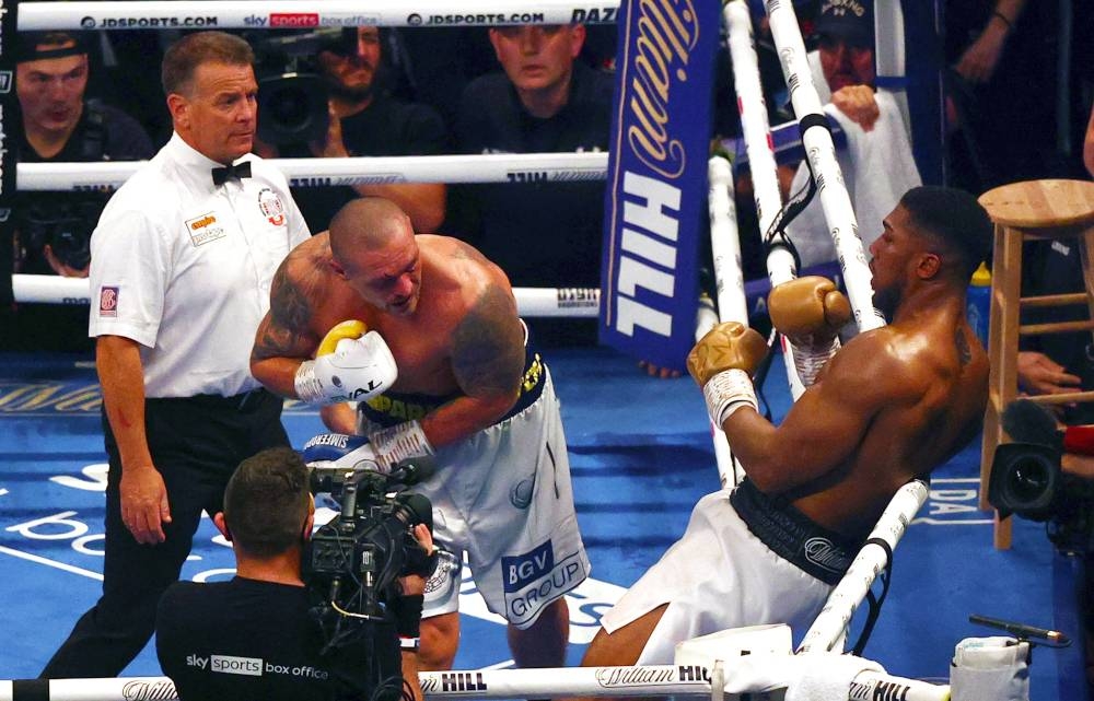 Ukrainian boxer Oleksandr Usyk fights British heavyweight champion boxer Anthony Joshua at the end of their heavyweight boxing match at Tottenham Hotspur Stadium in north London, September 25, 2021. Usyk defeated Joshua on points. — AFP pic