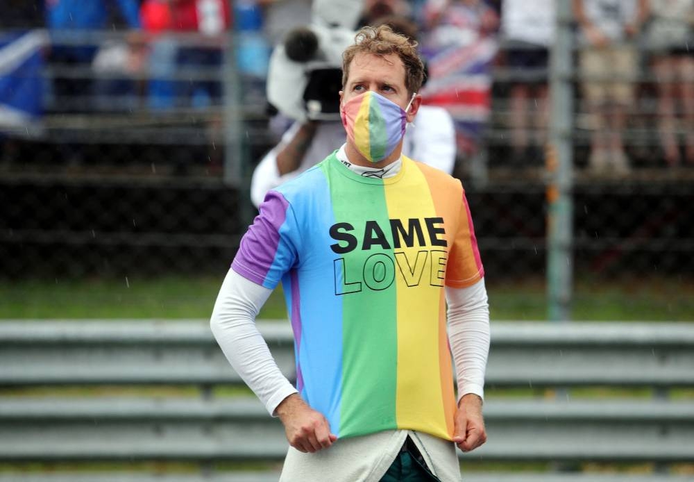  Aston Martin's Sebastian Vettel wearing a rainbow shirt before the Hungarian Grand Prix in Budapest, Hungary August 1, 2021. — Reuters pic