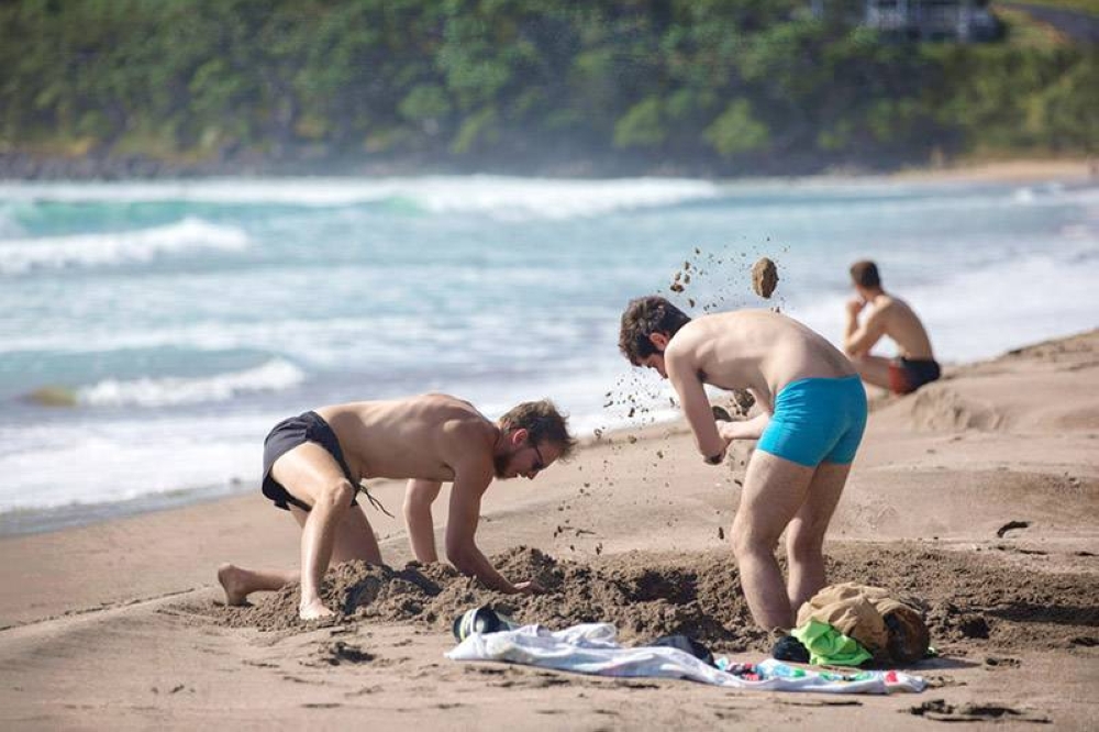 Wish you had a hot pool? In New Zealand, you could dig your own on Hot Water Beach with thermal springs beneath!