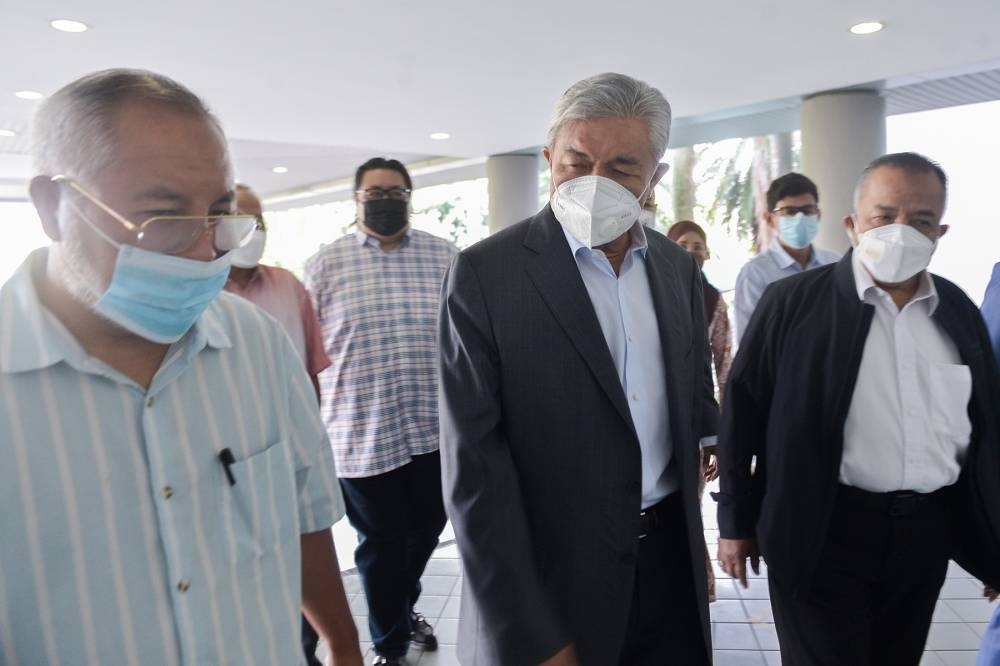 Former deputy prime minister, Datuk Seri Zahid Hamidi arrives for the Foreign Visa System (VLN) trial at Shah Alam High Court on June 9, 2022. — Picture by Miera Zulyana