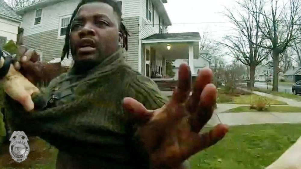 Michigan policeman charged with murder in shooting of Black man