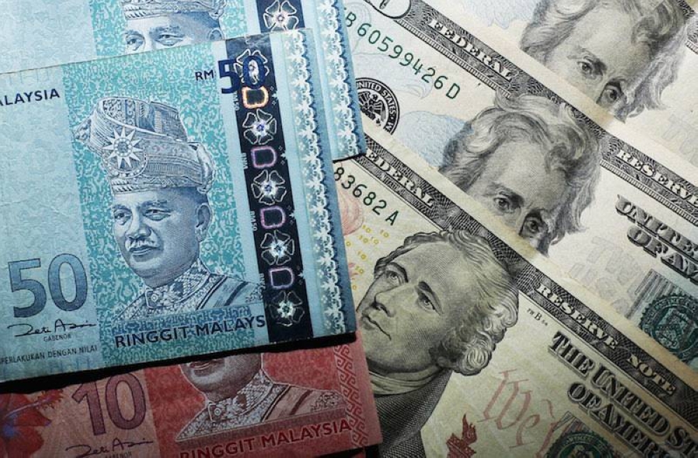 Ringgit ends lower against US dollar, surpasses 4.4-level